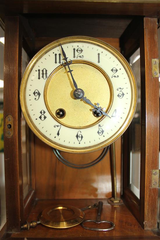 An early 20th century French walnut four glass mantel clock, 11.75in.